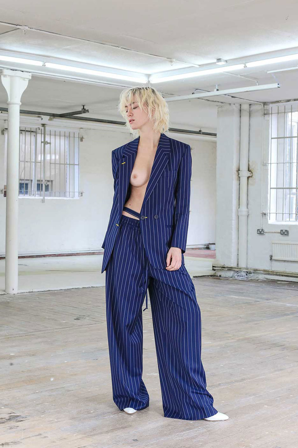 Blue pinstripe suit with wide-leg trousers
